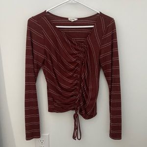 red and white striped long sleeve shirt